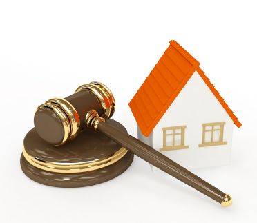 gavel next to a house